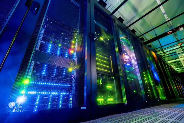 Colourful lighted rack of a data center.